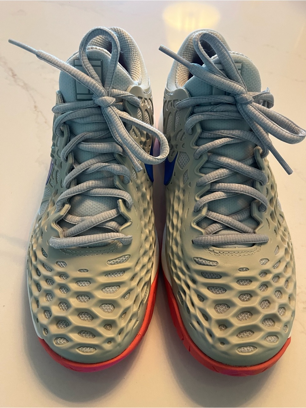 Nike Women's Light Blue Athletic Sneakers with Coral Outsole